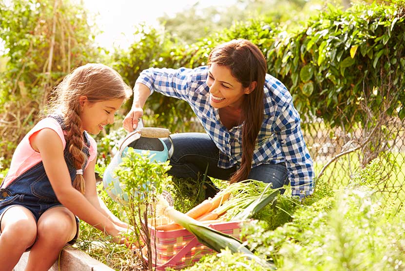 mother and daughter gardening - quality time
