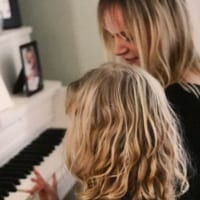 mother daughter at piano