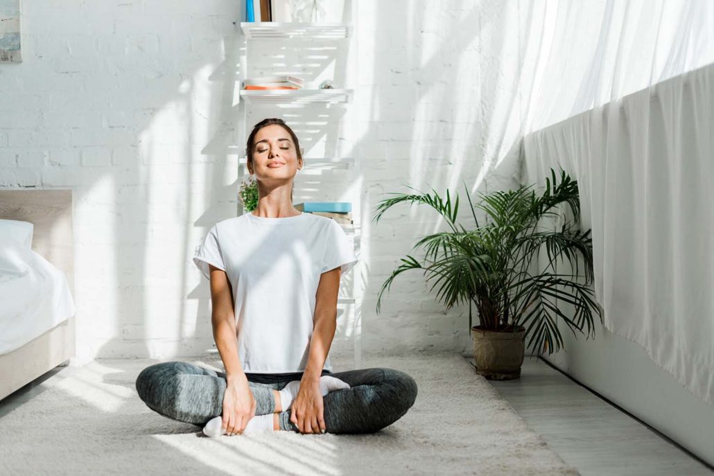 woman meditating - mindfulness