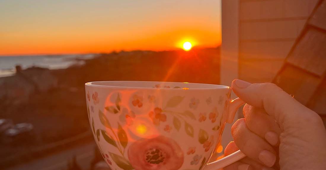 sunrise with coffee cup