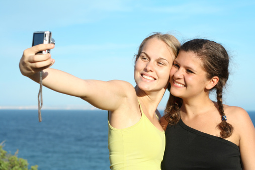 two good friends taking selfie