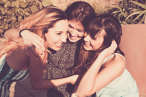 three woman - close friends. letting people in