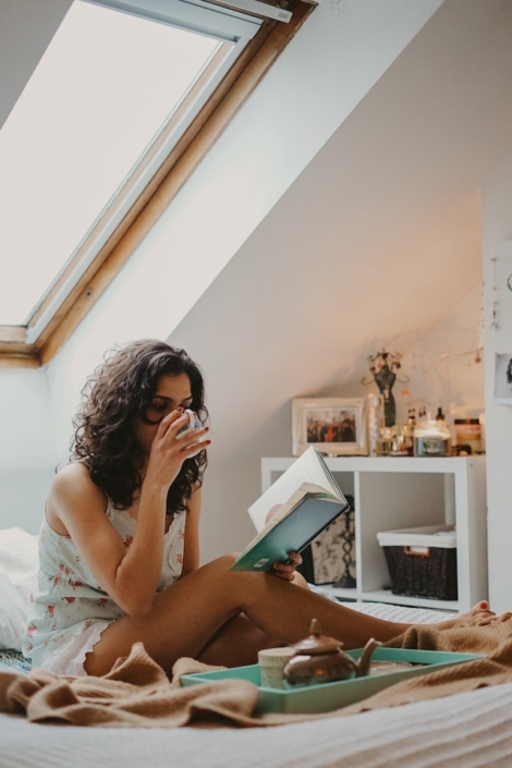 Photo by Toa Heftiba on Unsplash Woman sitting in bed. Allowing herself to feel lazy. Her mind wanders.