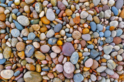 Photograph of colorful pebbles and rocks. Endless possibilities like in Tao Te Ching.