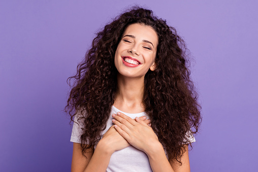 woman smiling and grateful